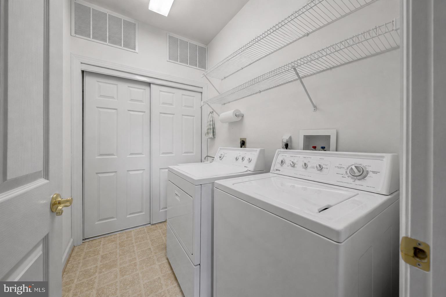1925 Logan Manor Drive Reston, VA 20190 - Photo 28 of 61 a utility room with dryer and washer