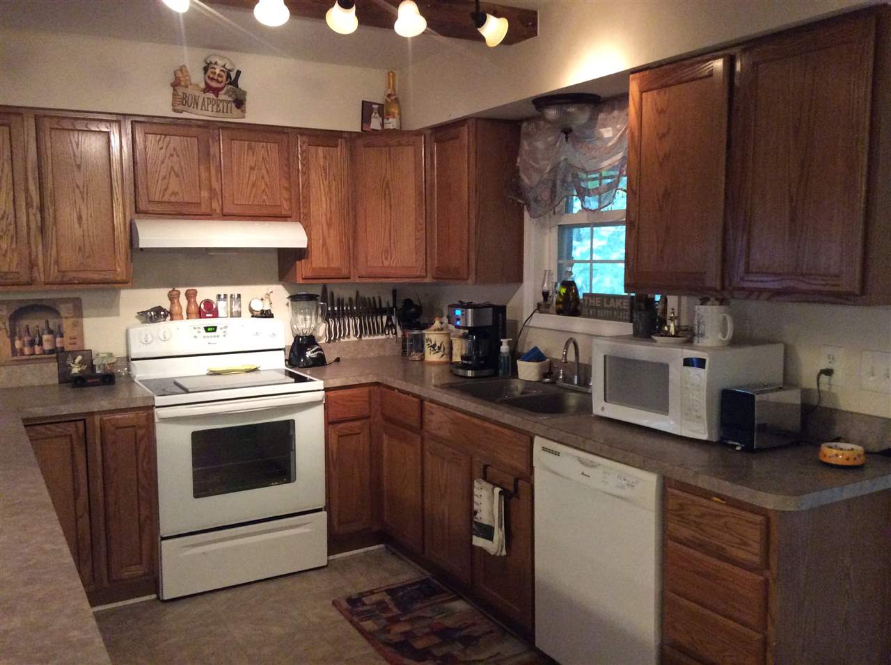 4003 Ruth Road Madison, VA 22727 - Photo 11 of 38 a kitchen that has a sink and a stove in it