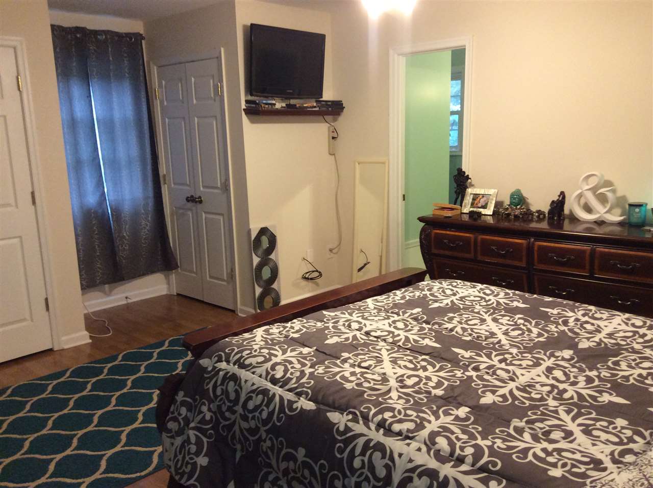 4003 Ruth Road Madison, VA 22727 - Photo 23 of 38 a bedroom with a bed and a flat screen tv