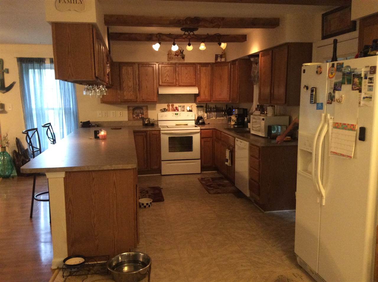 4003 Ruth Road Madison, VA 22727 - Photo 8 of 38 a kitchen with refrigerator and cabinets