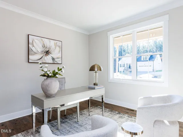 a workspace with furniture and a window