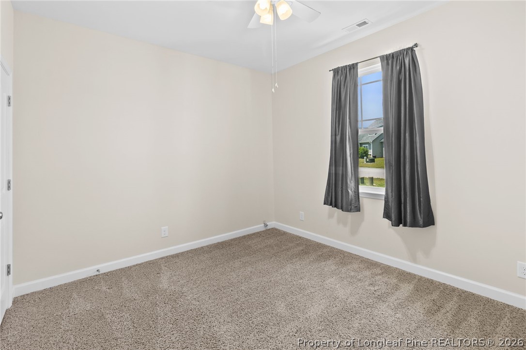 216 Meherrin Loop Raeford, NC 28376 - Photo 27 of 38 an empty room with a window