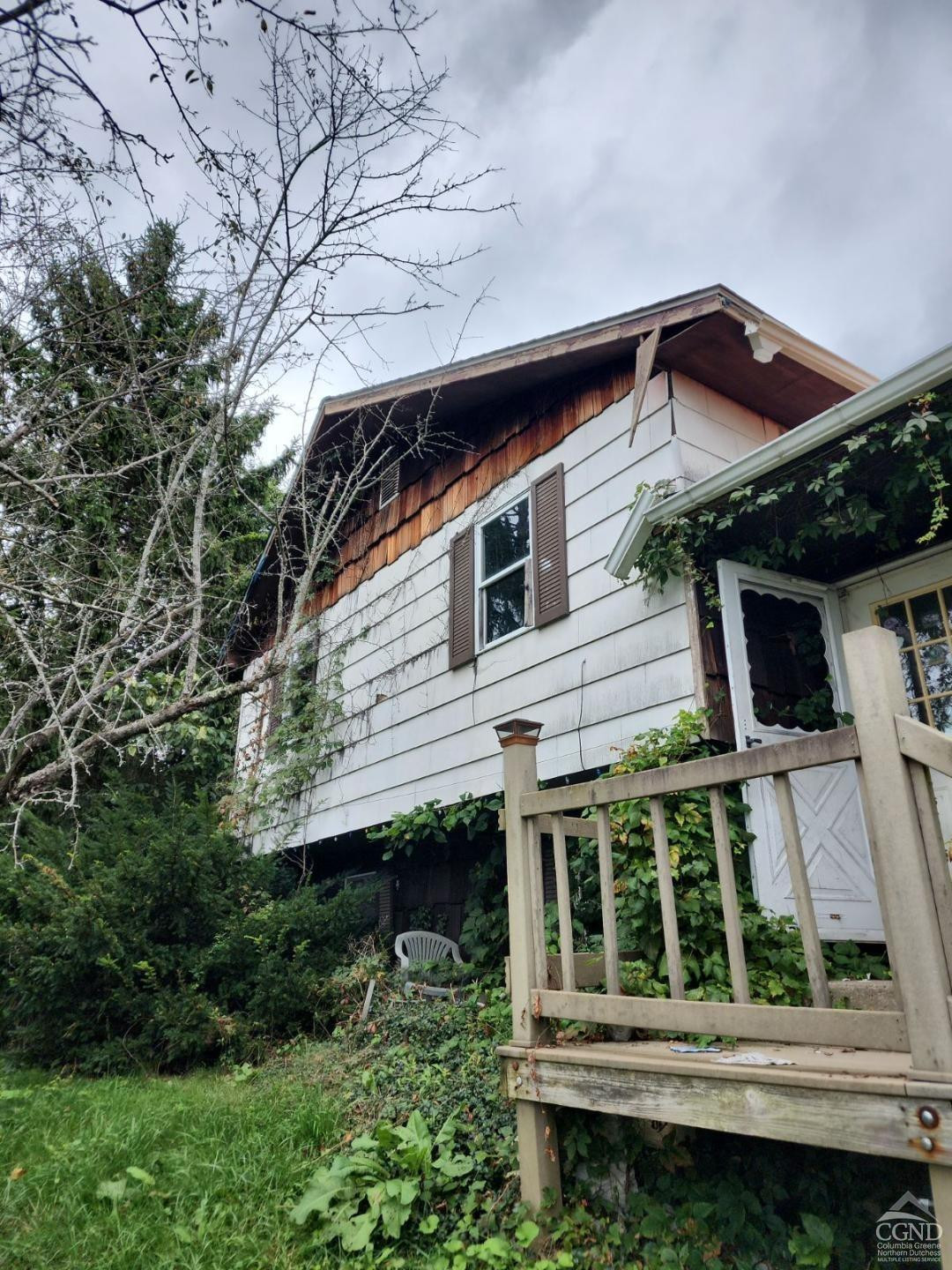 10 Elizabeth Drive Plattekill, NY 12589 - Photo 2 of 11 a view of a house with a window and wooden fence