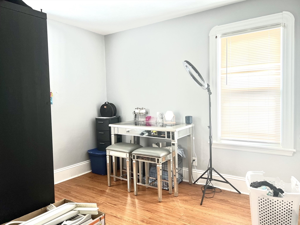 30 Rodney Street, Unit 2 New Bedford, MA 02744 - Photo 12 of 15 a view of a dining room with furniture window and outside view