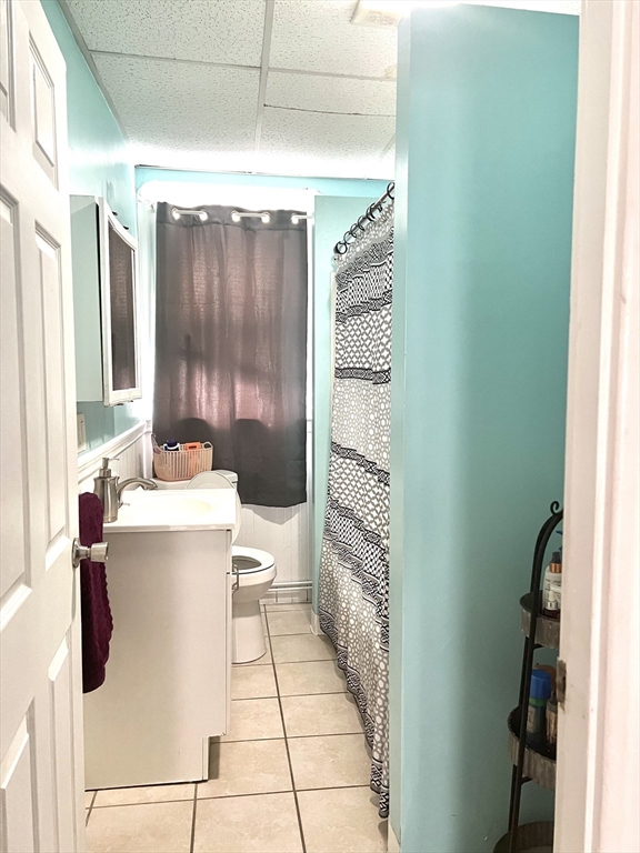 30 Rodney Street, Unit 2 New Bedford, MA 02744 - Photo 15 of 15 a bathroom with a sink toilet and shower