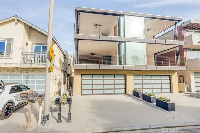 a front view of a house with large windows
