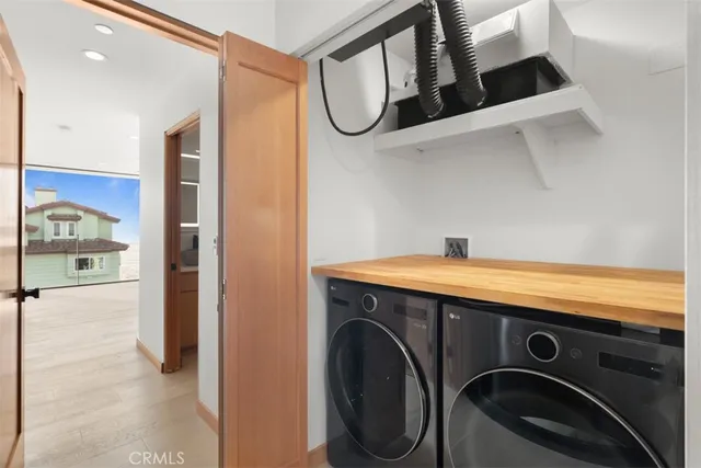 a view of a sink and a window