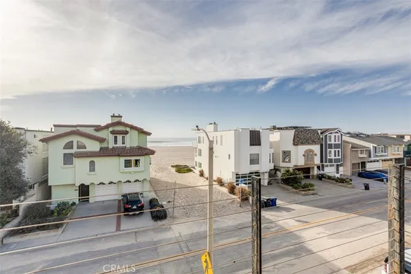 an aerial view of residential building and parking space