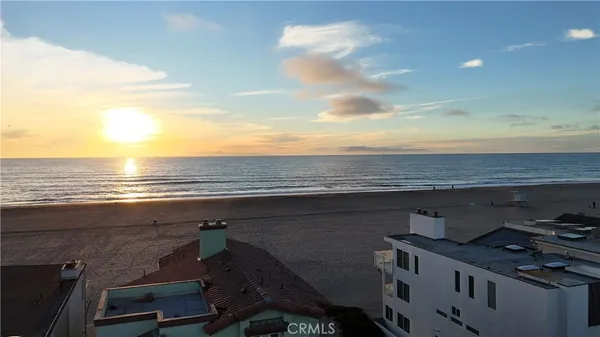 a bedroom with a bed and a ceiling fan
