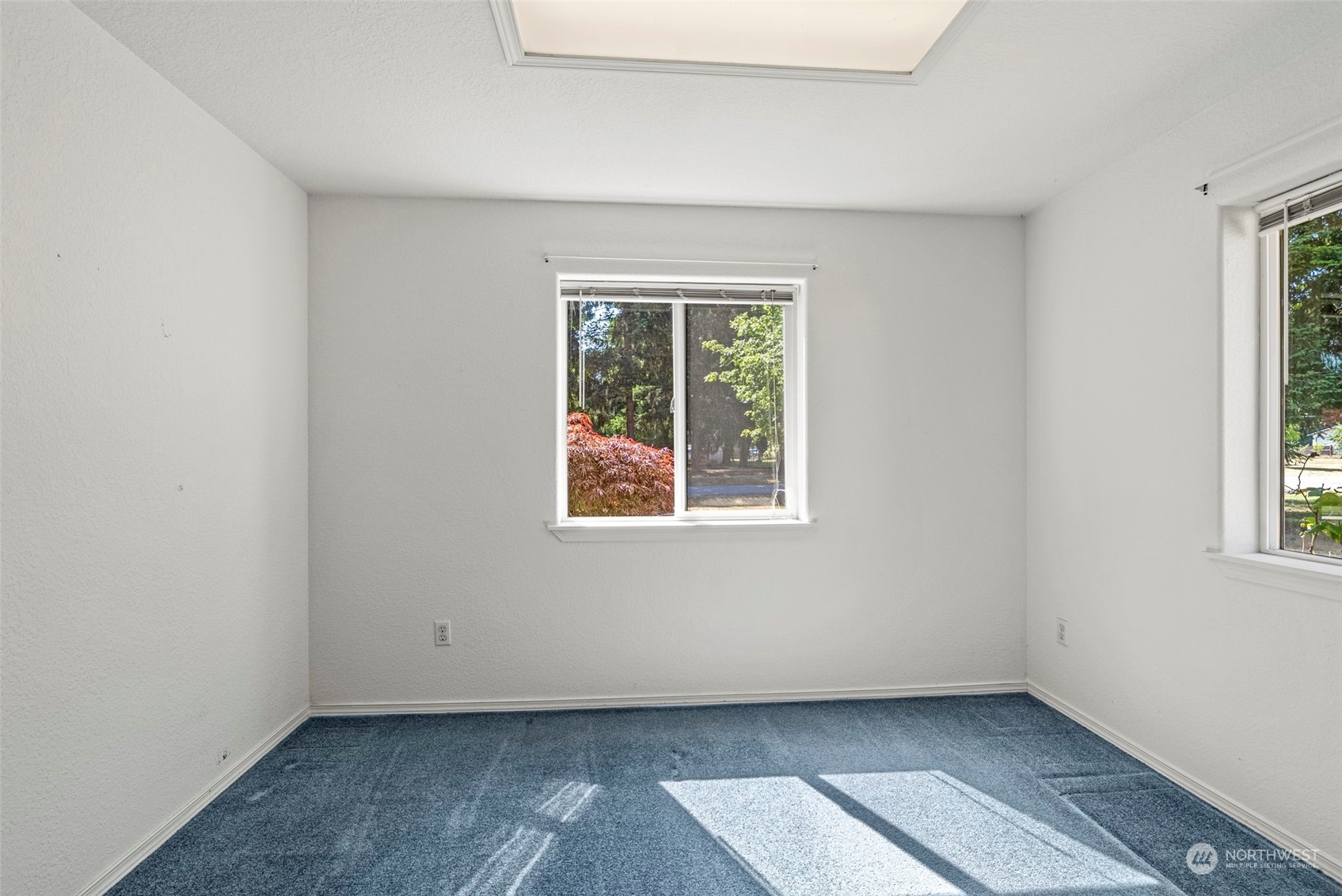 18728 Sams Place Southwest Rochester, WA 98579 - Photo 24 of 28 an empty room with a window