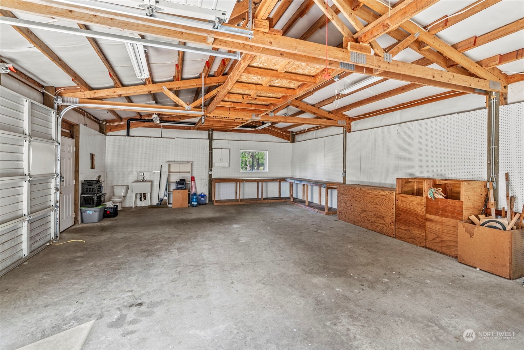 18728 Sams Place Southwest Rochester, WA 98579 - Photo 28 of 28 a view of a room with wooden walls