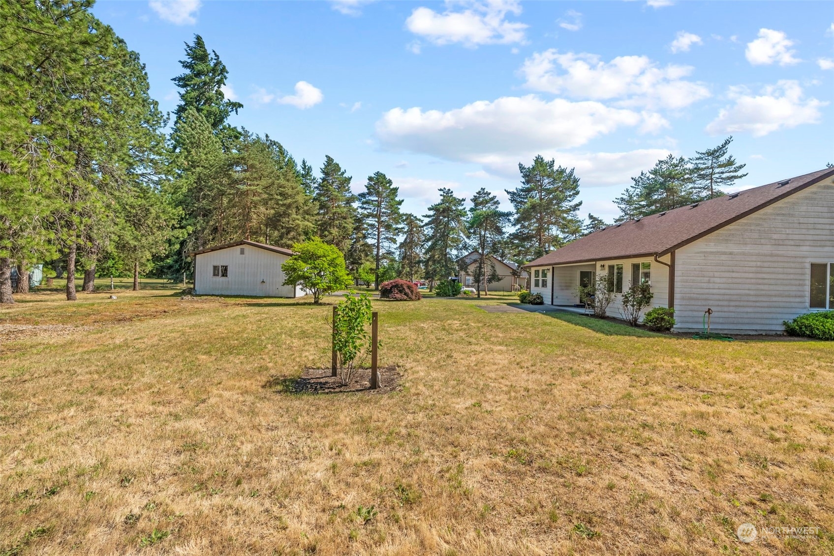 18728 Sams Place Southwest Rochester, WA 98579 - Photo 8 of 28 a house view with a trees