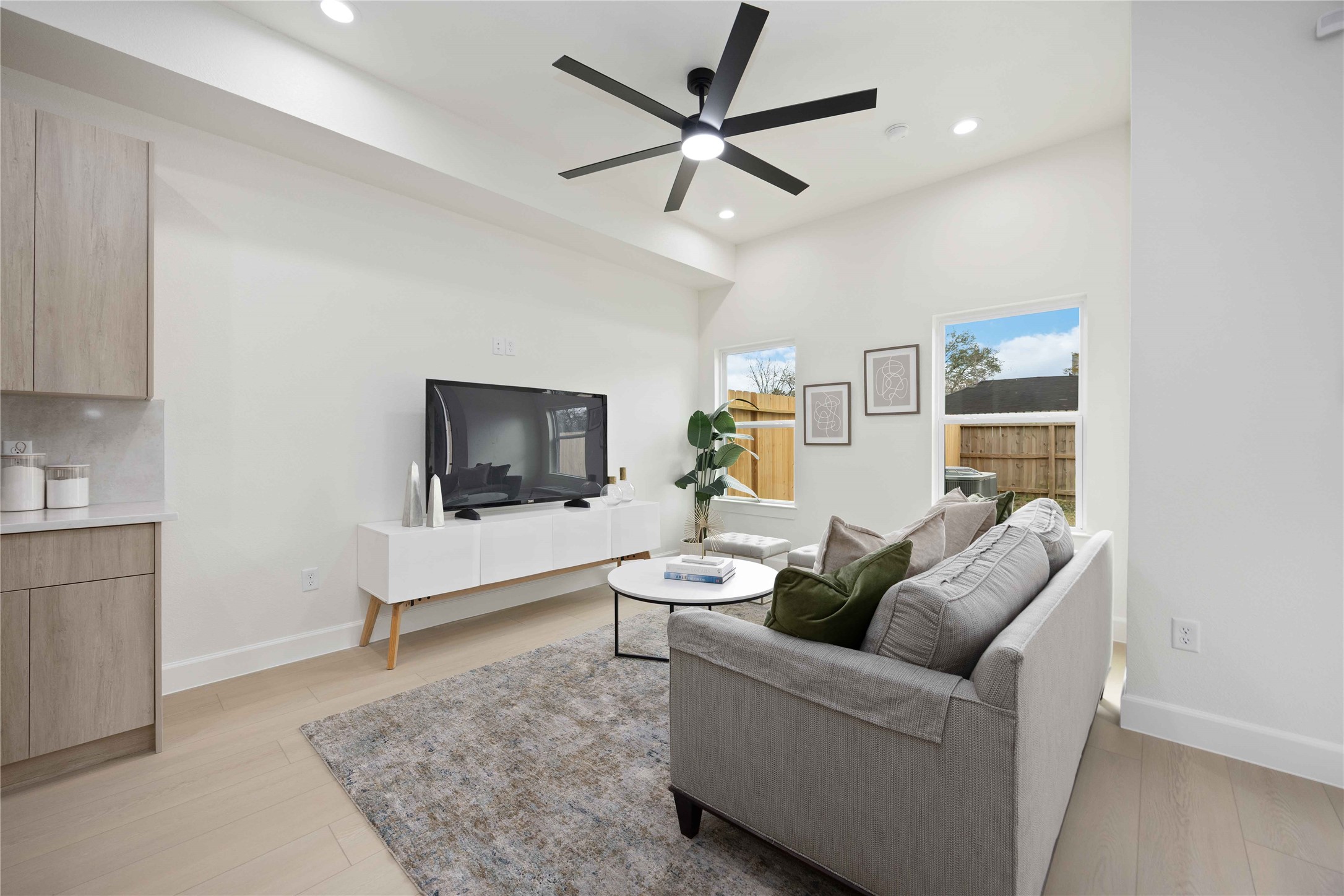 3528 Amos Street Houston, TX 77021 - Photo 11 of 30 a living room with furniture and a flat screen tv
