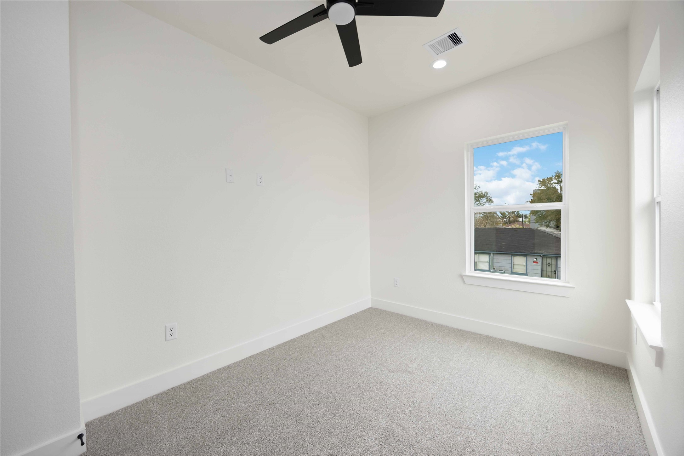 3528 Amos Street Houston, TX 77021 - Photo 20 of 30 an empty room with a window