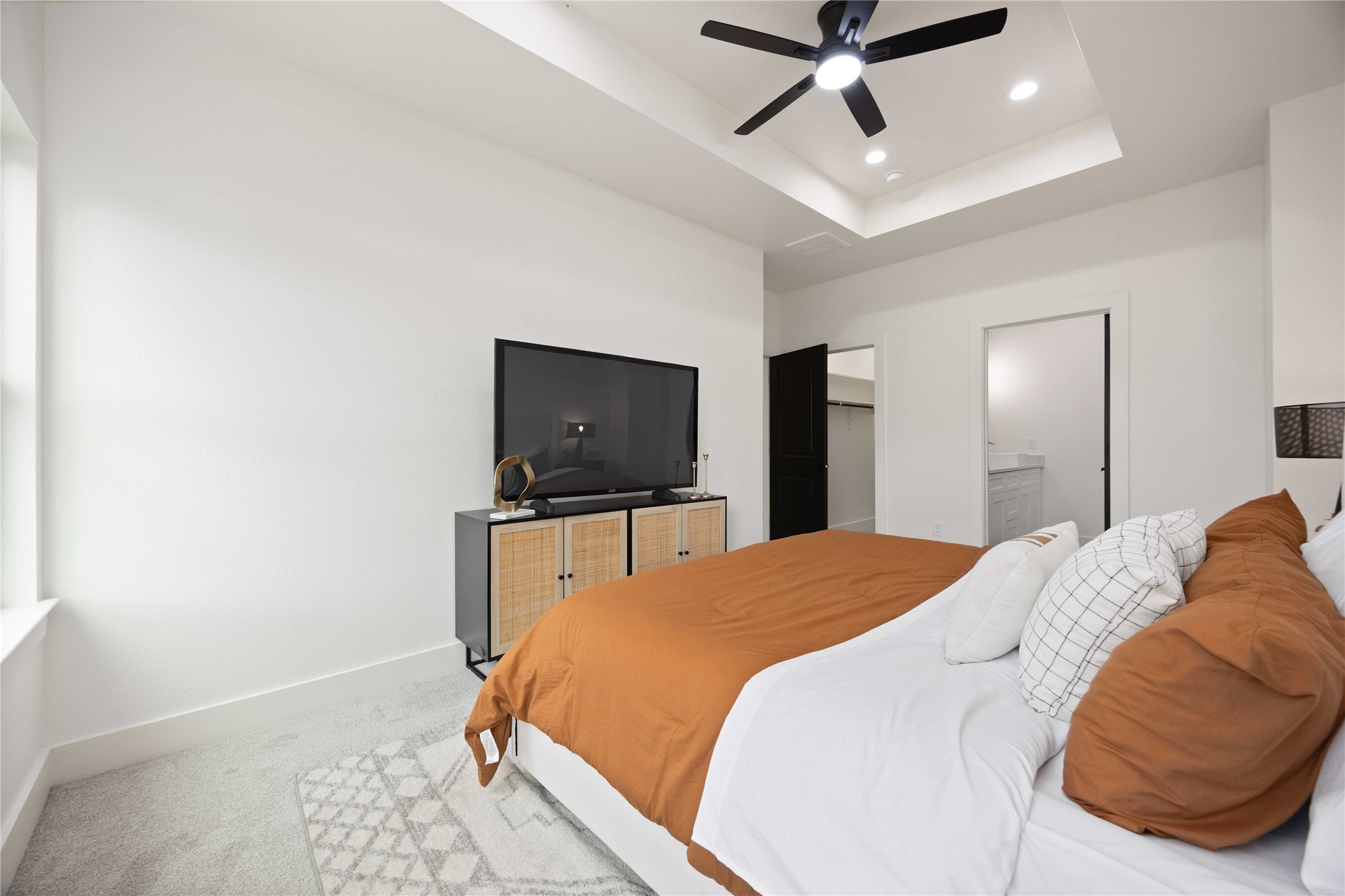 3528 Amos Street Houston, TX 77021 - Photo 22 of 30 a bedroom with a bed and a tv