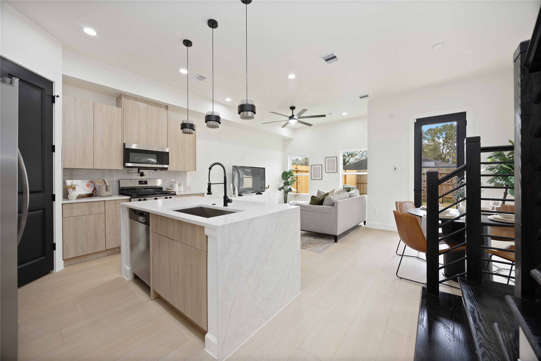 3528 Amos Street Houston, TX 77021 - Photo 6 of 30 a kitchen that has a lot of cabinets in it and appliances