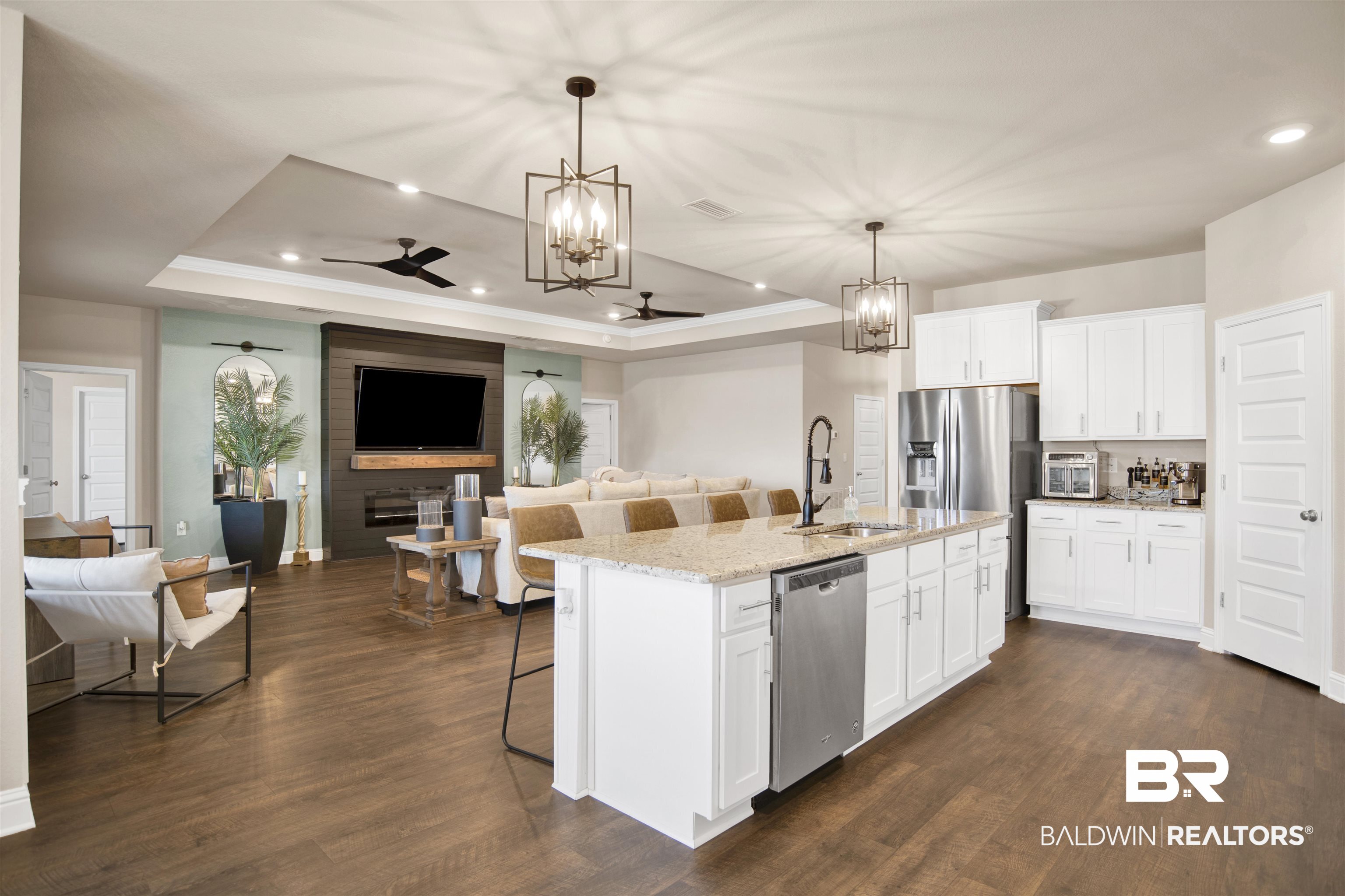 8493 Bronze Lane Foley, AL 36535 - Photo 14 of 38 Open-concept kitchen and living area featuring wood-finish flooring