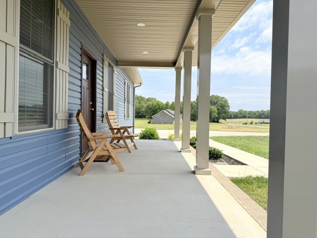 745 Alman Cemetery Road Paris, TN 38242 - Photo 3 of 31 a building outdoor space with seating space