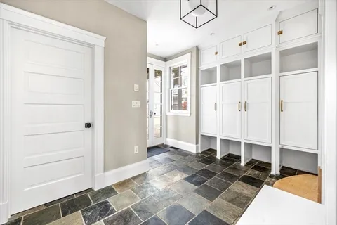 a view of a closet area with living room