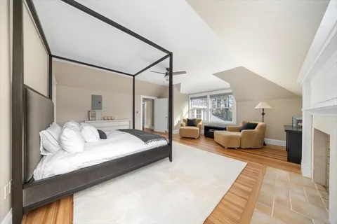 a white bath tub sitting next to a window