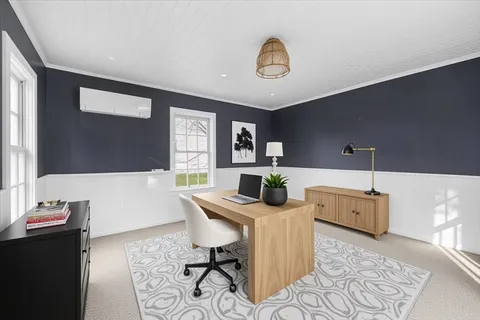 a view of a room with wooden walls