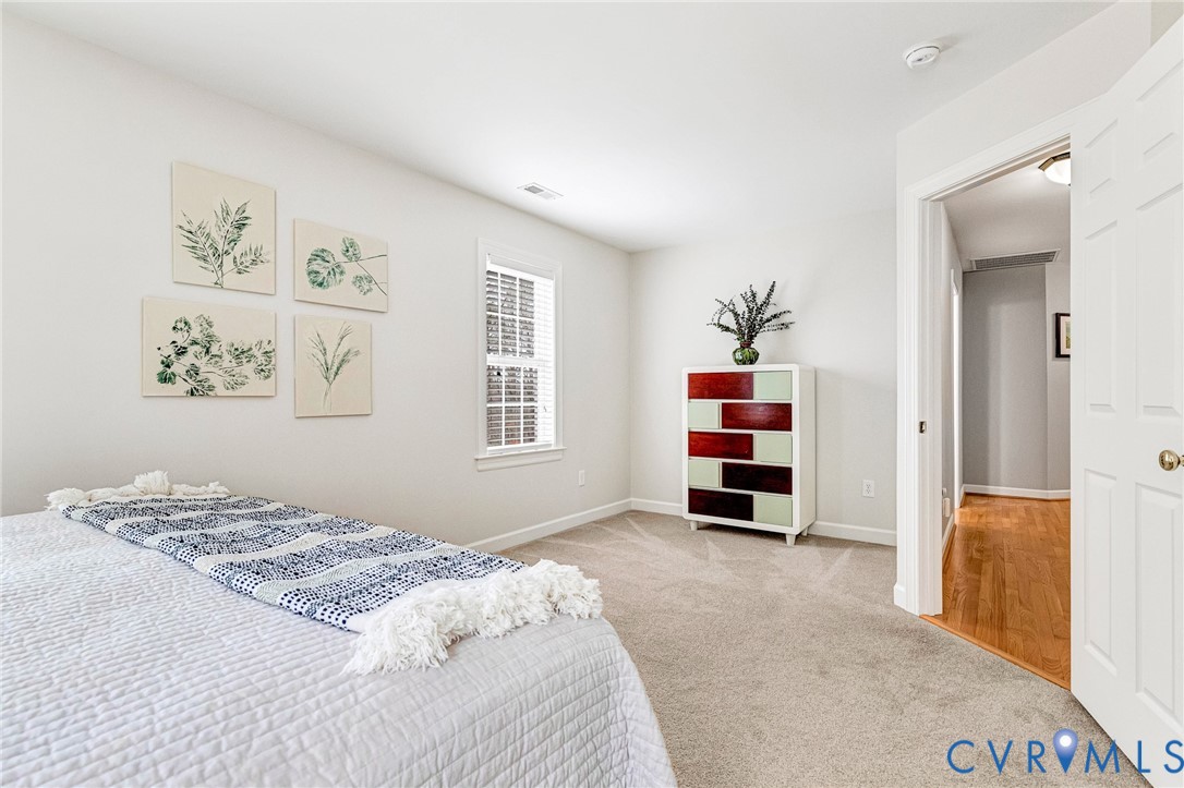 14436 Overlook Ridge Lane Beaverdam, VA 23015 - Photo 38 of 82 a bedroom with bed and a window