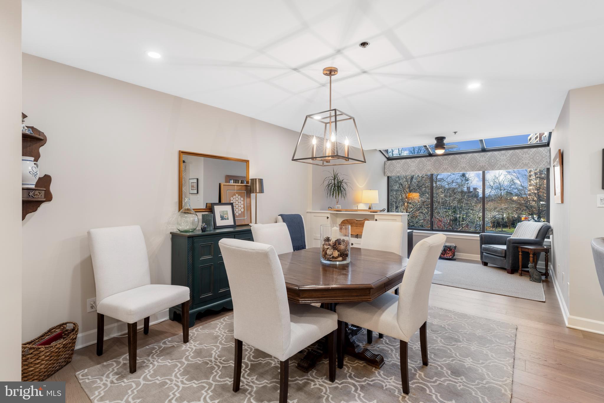 2 Southerly Court, Unit 302 Towson, MD 21286 - Photo 6 of 34 a view of a dining room with furniture window and outside view