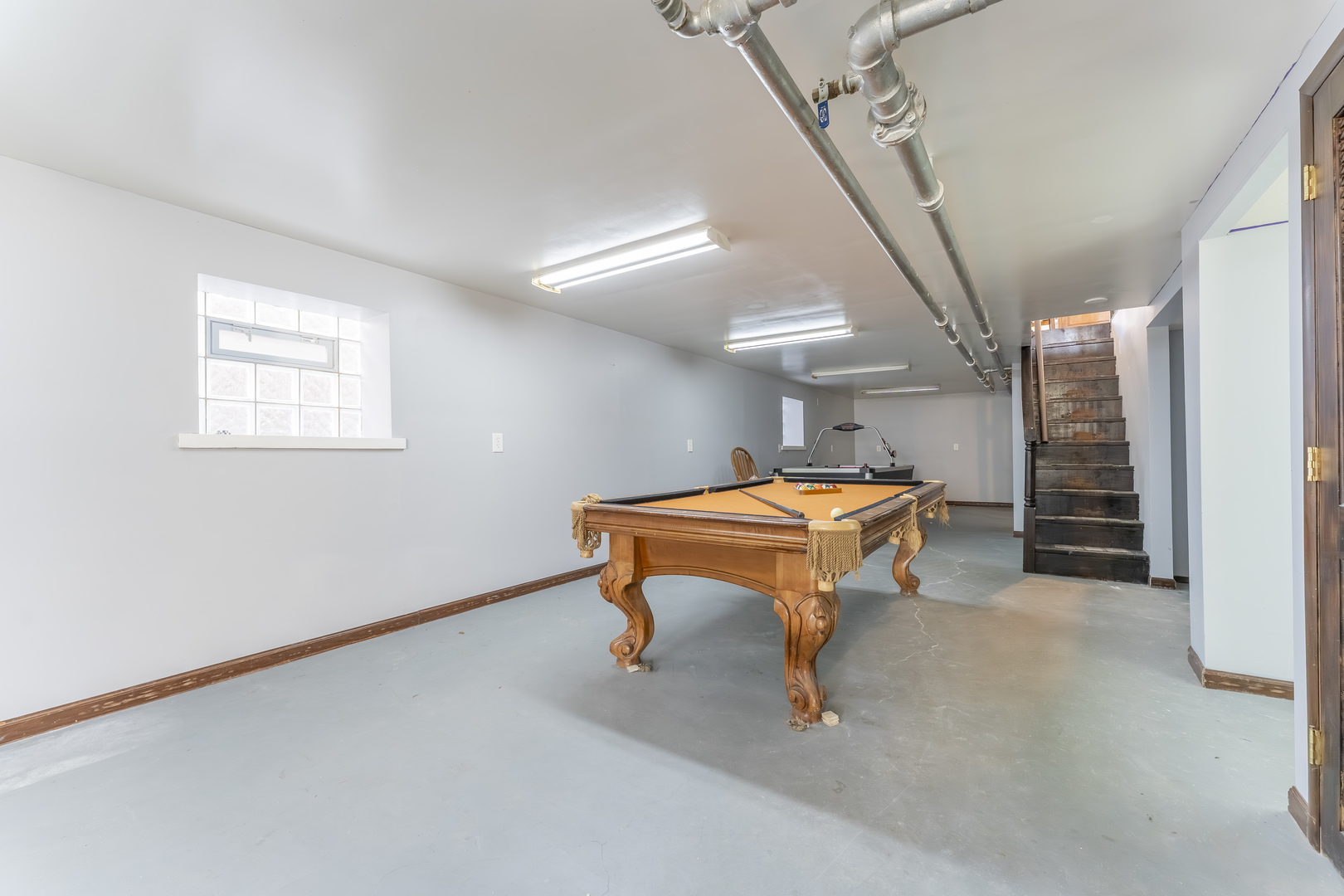 5454 West Eddy Street Chicago, IL 60641 - Photo 16 of 22 a room with furniture and window