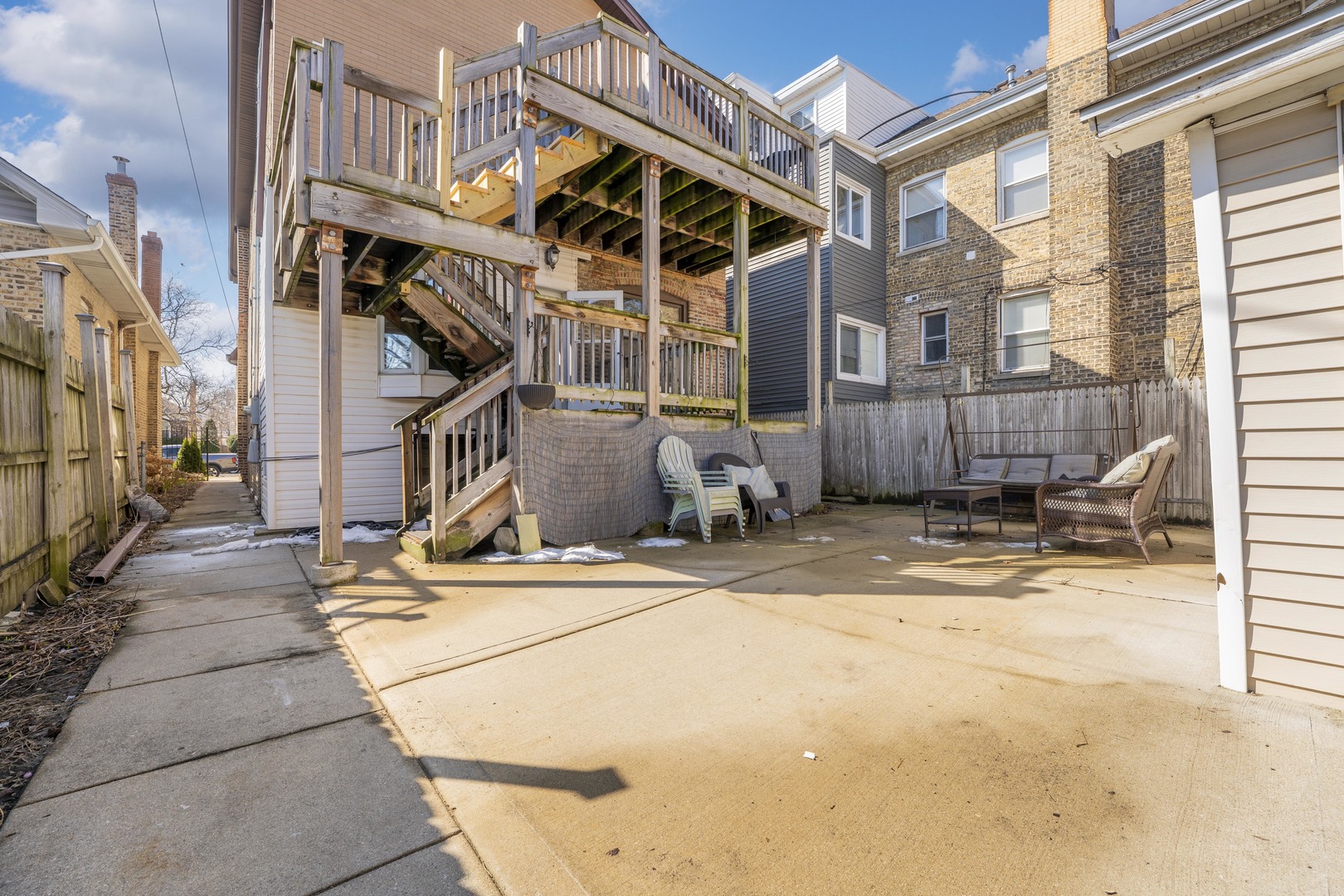5454 West Eddy Street Chicago, IL 60641 - Photo 20 of 22 a view of a house with large windows
