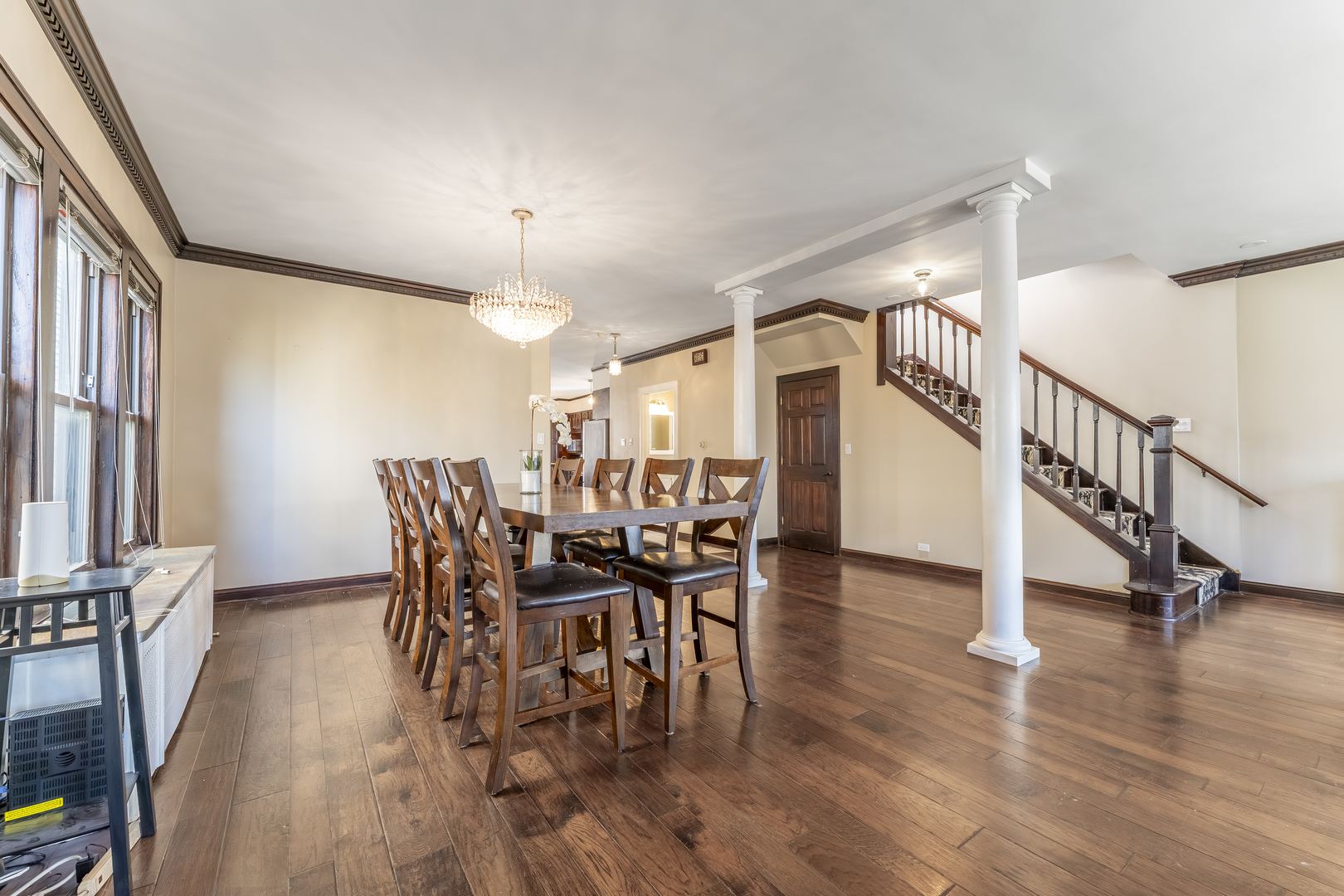 5454 West Eddy Street Chicago, IL 60641 - Photo 4 of 22 a view of a dining room with furniture and wooden floor