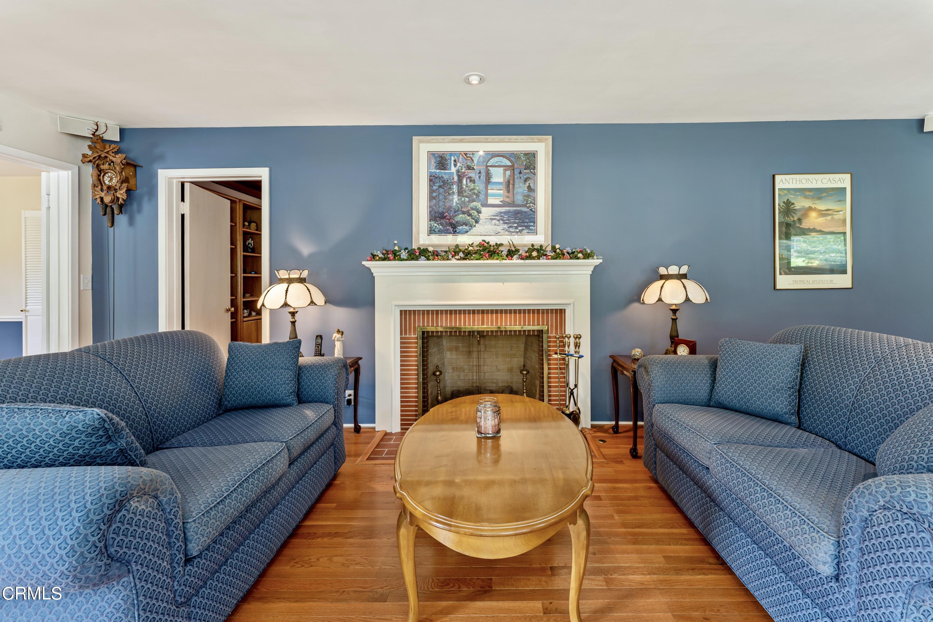 3850 Shadow Grove Road Pasadena, CA 91107 - Photo 12 of 53 a living room with furniture and a fireplace
