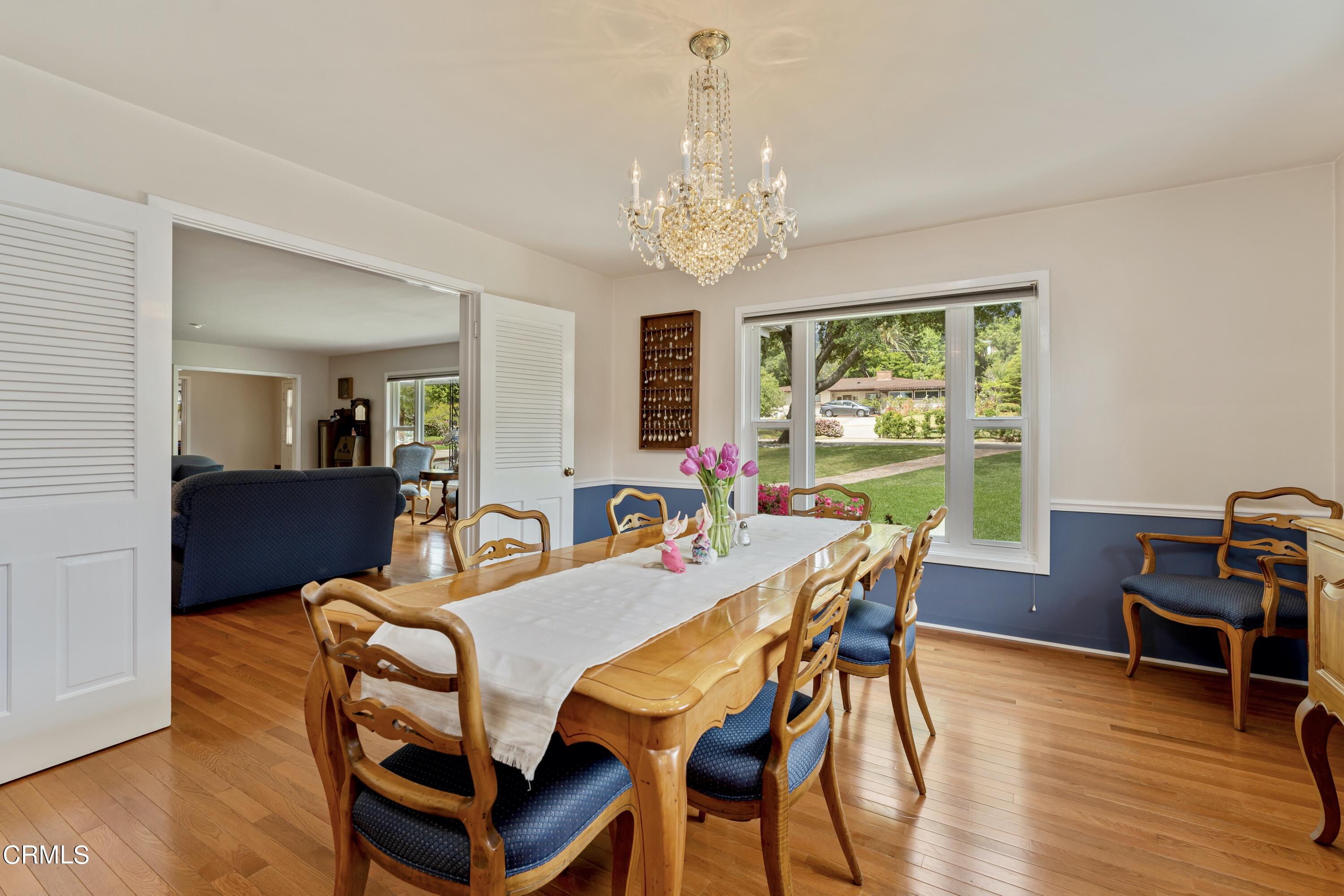 3850 Shadow Grove Road Pasadena, CA 91107 - Photo 15 of 53 a view of a dining room with furniture window and wooden floor