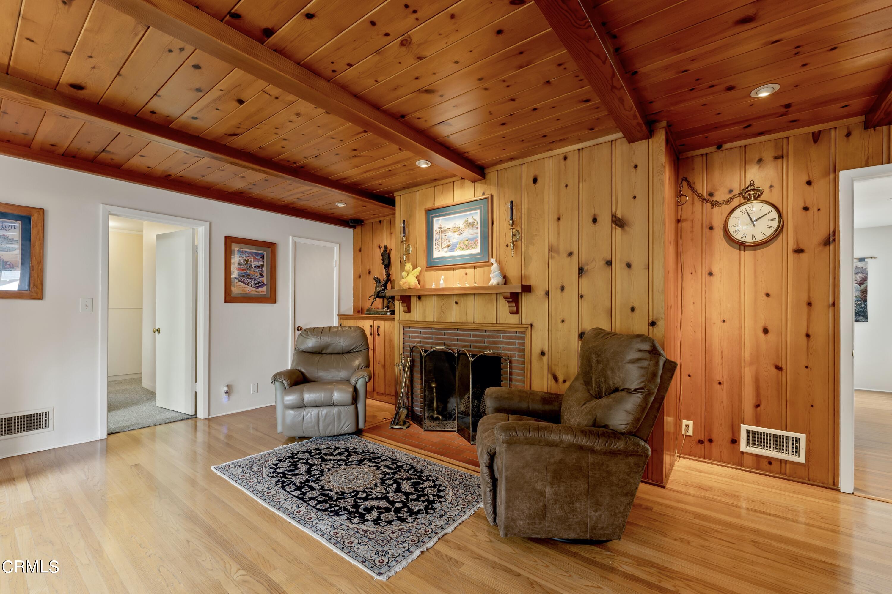 3850 Shadow Grove Road Pasadena, CA 91107 - Photo 16 of 53 a living room with furniture and a fireplace