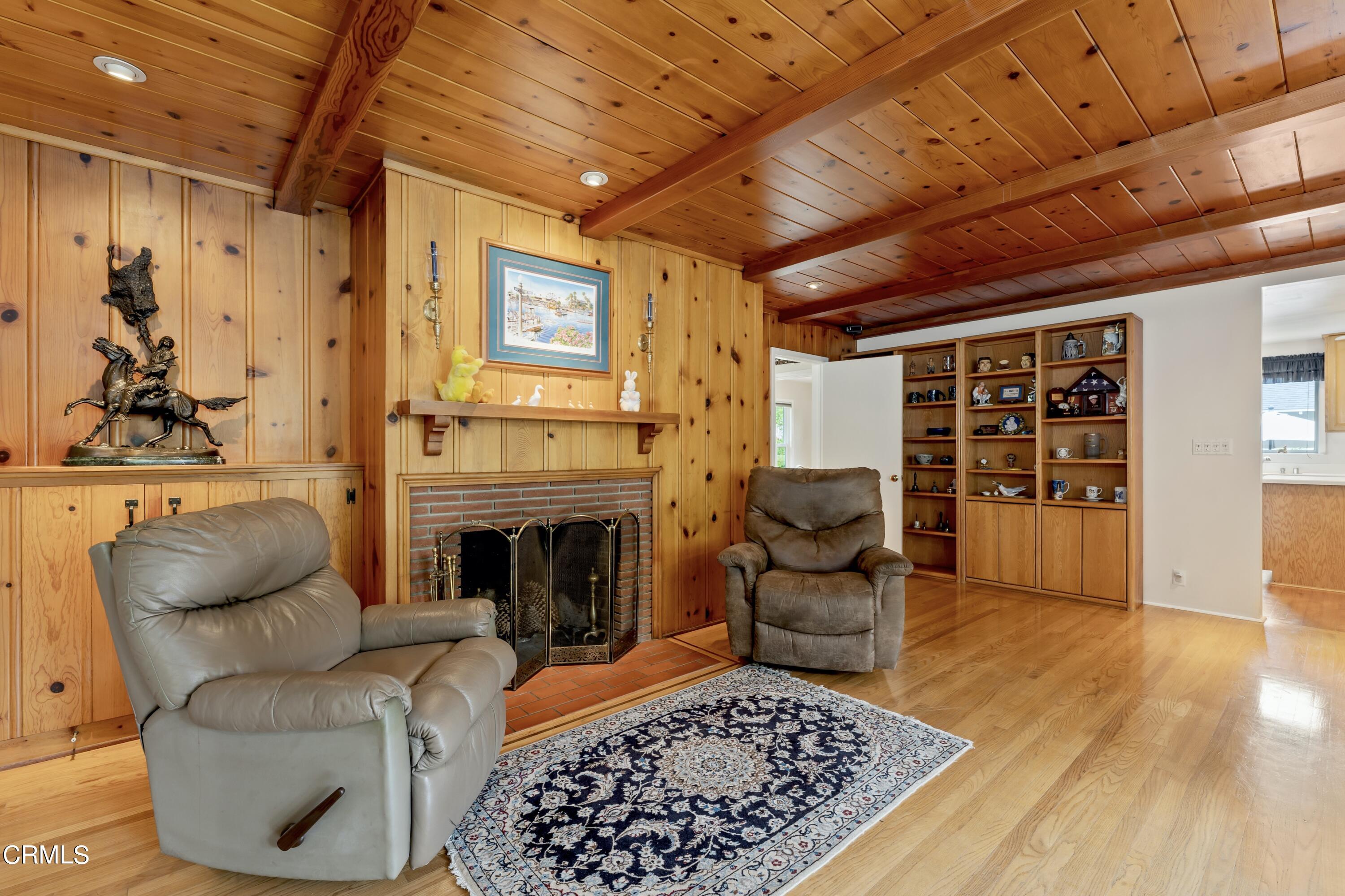 3850 Shadow Grove Road Pasadena, CA 91107 - Photo 17 of 53 a living room with furniture and a fireplace