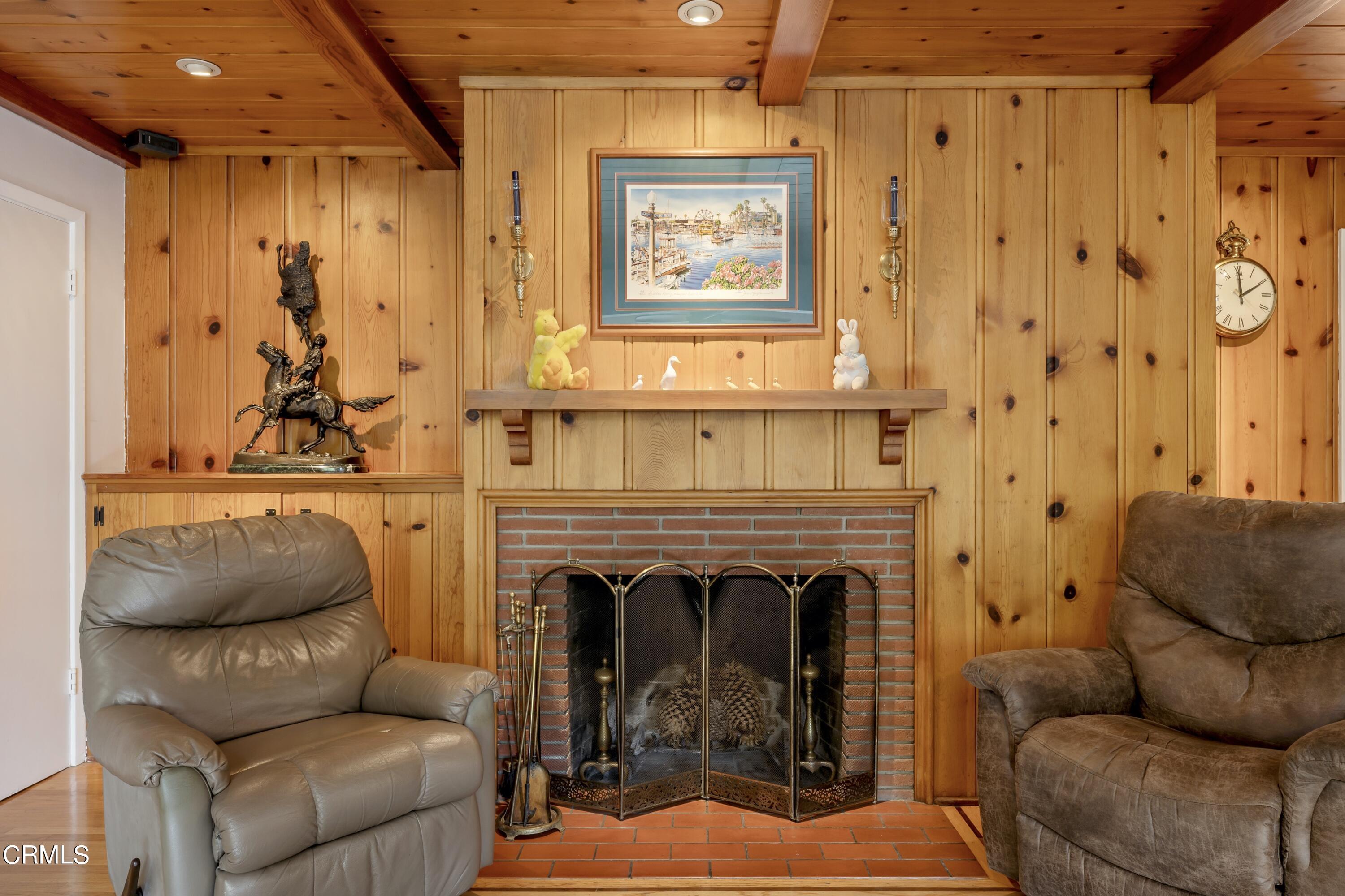 3850 Shadow Grove Road Pasadena, CA 91107 - Photo 18 of 53 a living room with furniture and a fireplace
