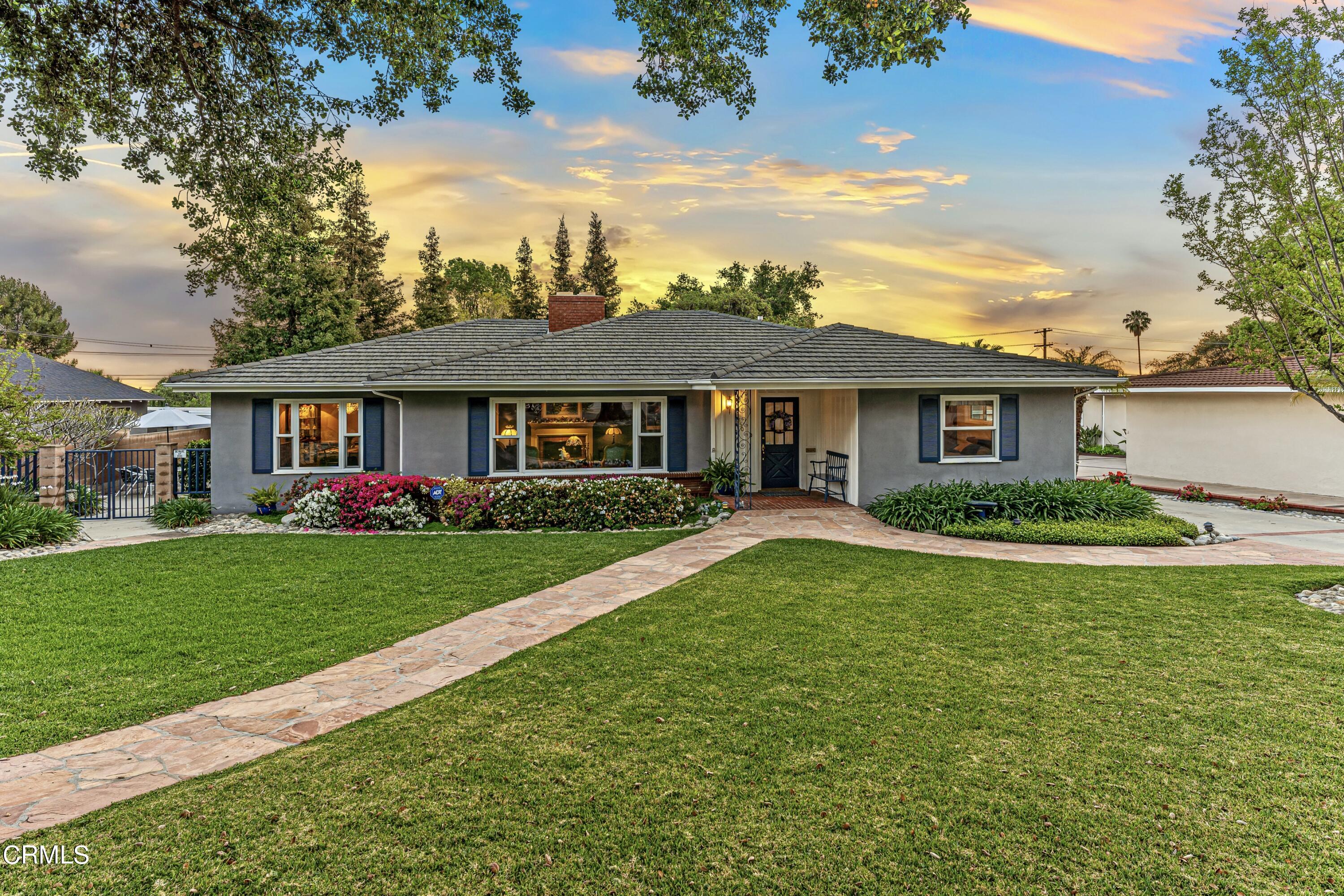 3850 Shadow Grove Road Pasadena, CA 91107 - Photo 2 of 53 a front view of a house with a garden