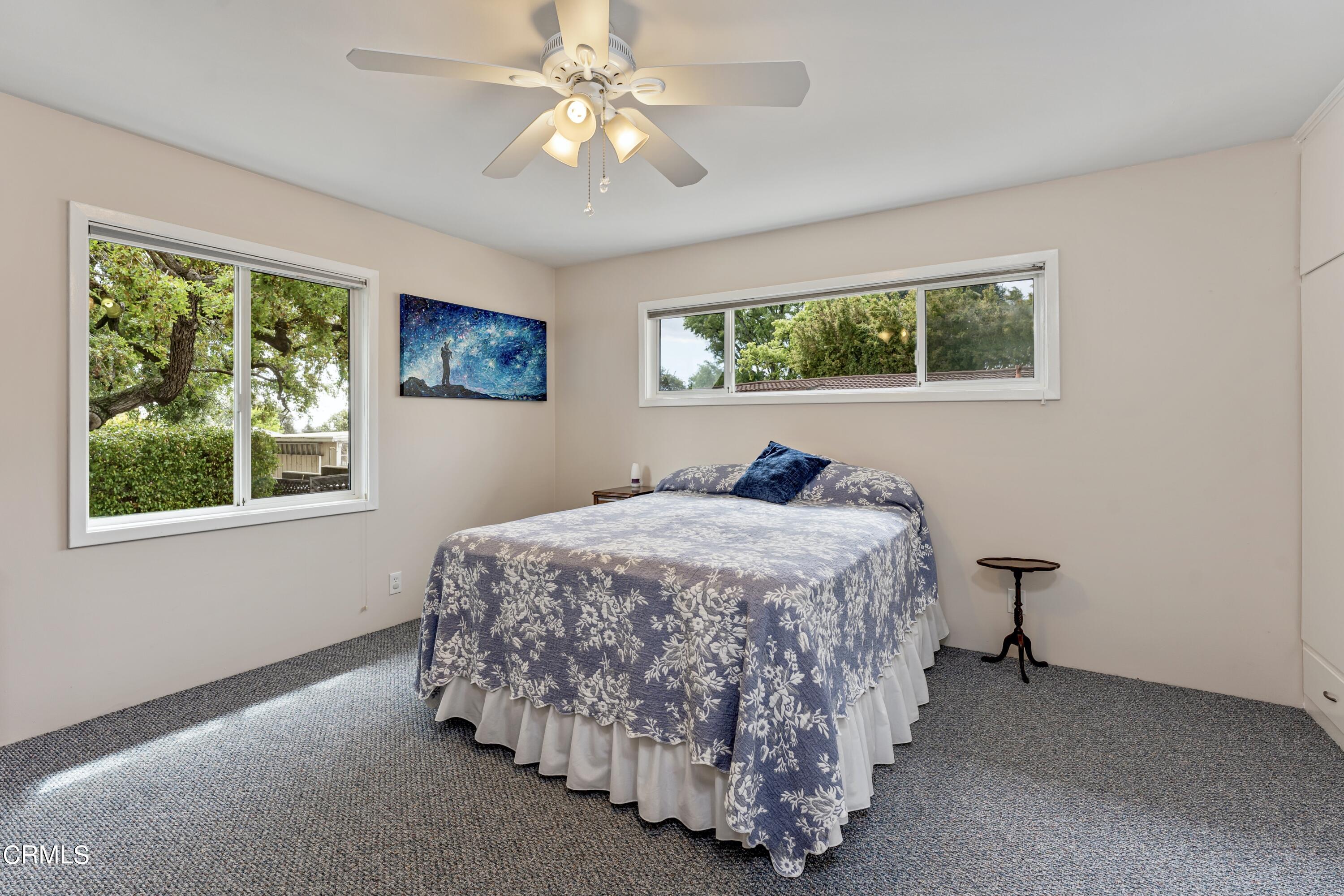 3850 Shadow Grove Road Pasadena, CA 91107 - Photo 34 of 53 a bedroom with a bed and a window