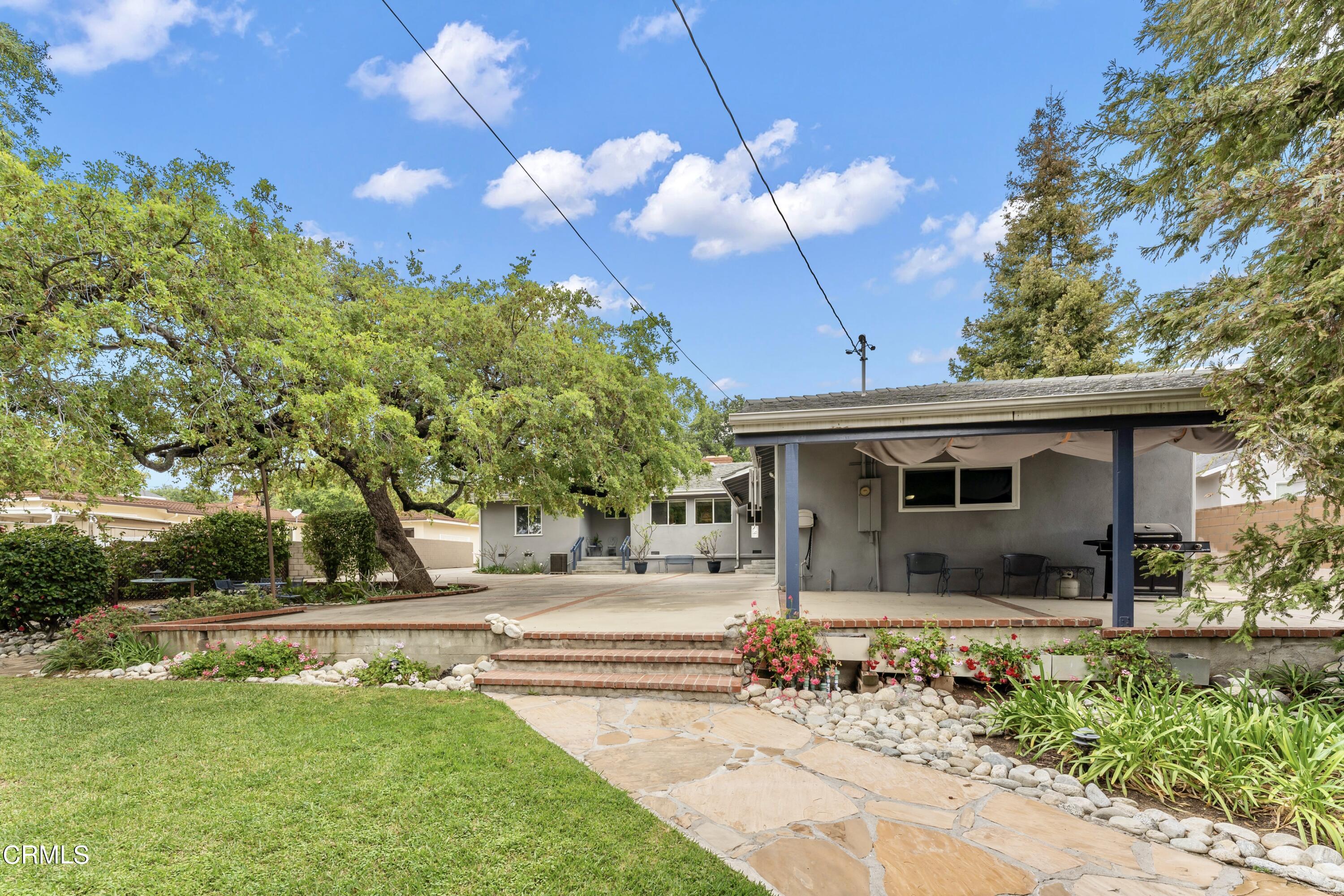 3850 Shadow Grove Road Pasadena, CA 91107 - Photo 43 of 53 a view of a house with yard and sitting area