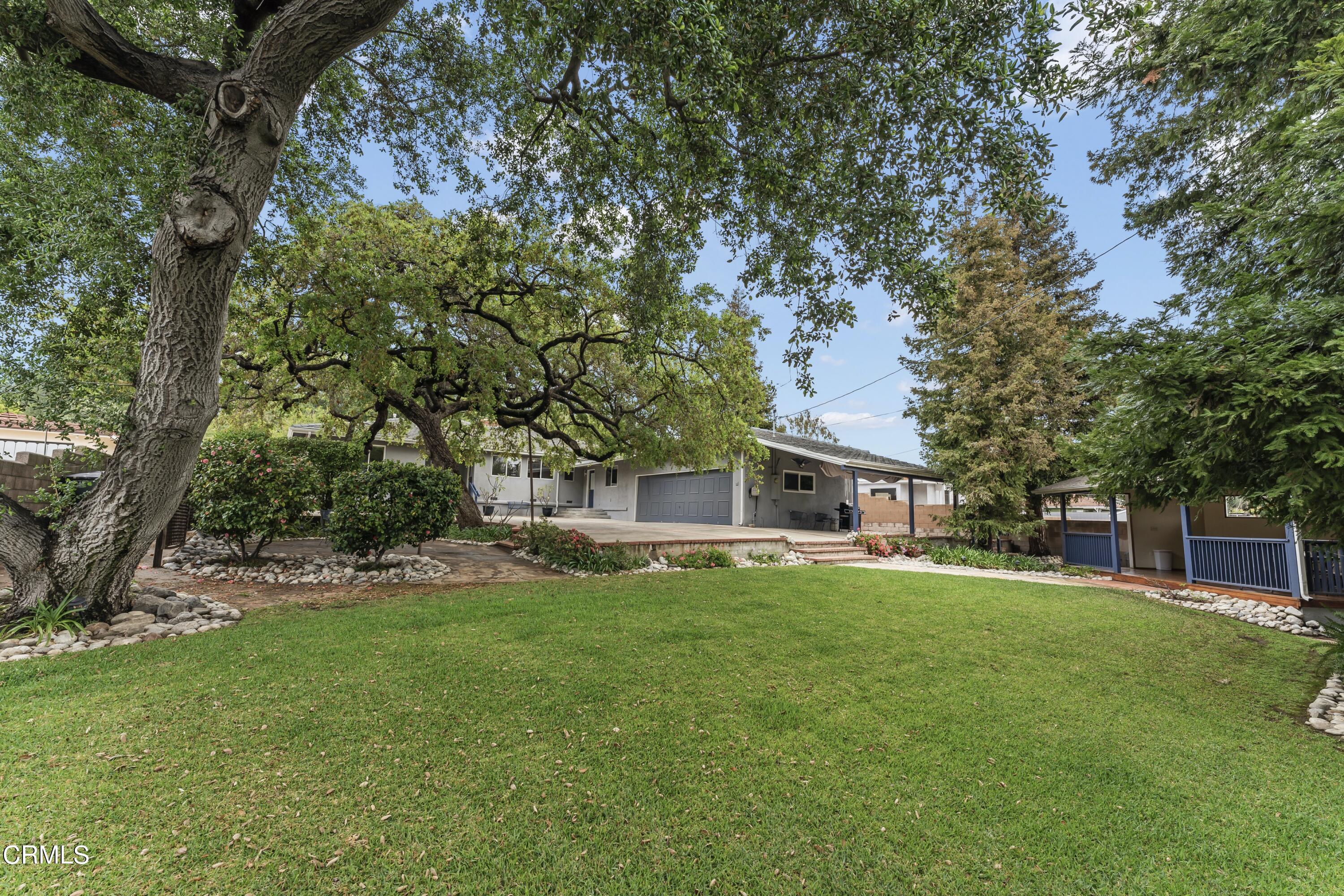 3850 Shadow Grove Road Pasadena, CA 91107 - Photo 48 of 53 front view of a house with a yard