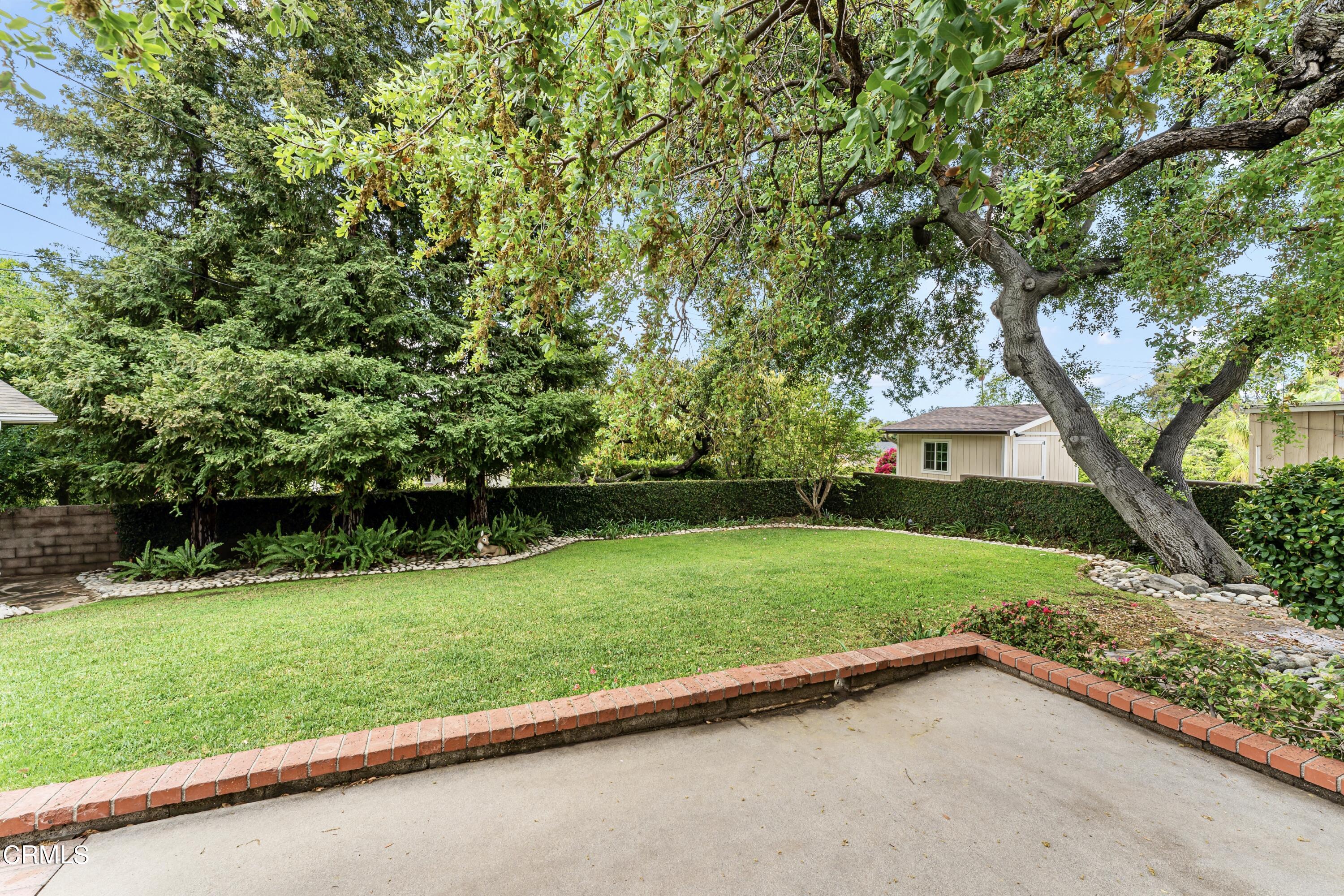 3850 Shadow Grove Road Pasadena, CA 91107 - Photo 49 of 53 a view of a backyard with a garden
