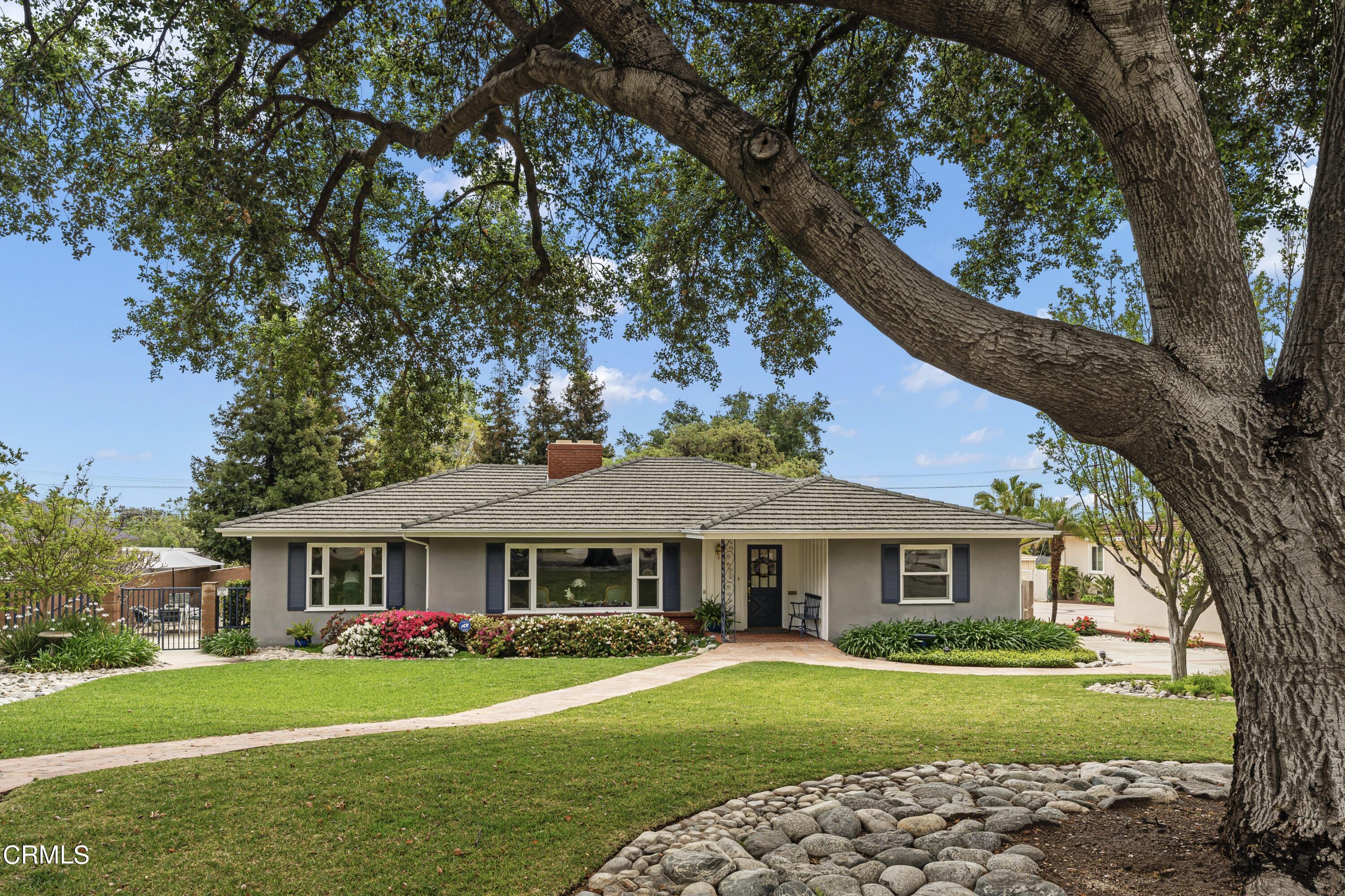 3850 Shadow Grove Road Pasadena, CA 91107 - Photo 6 of 53 a front view of a house with garden