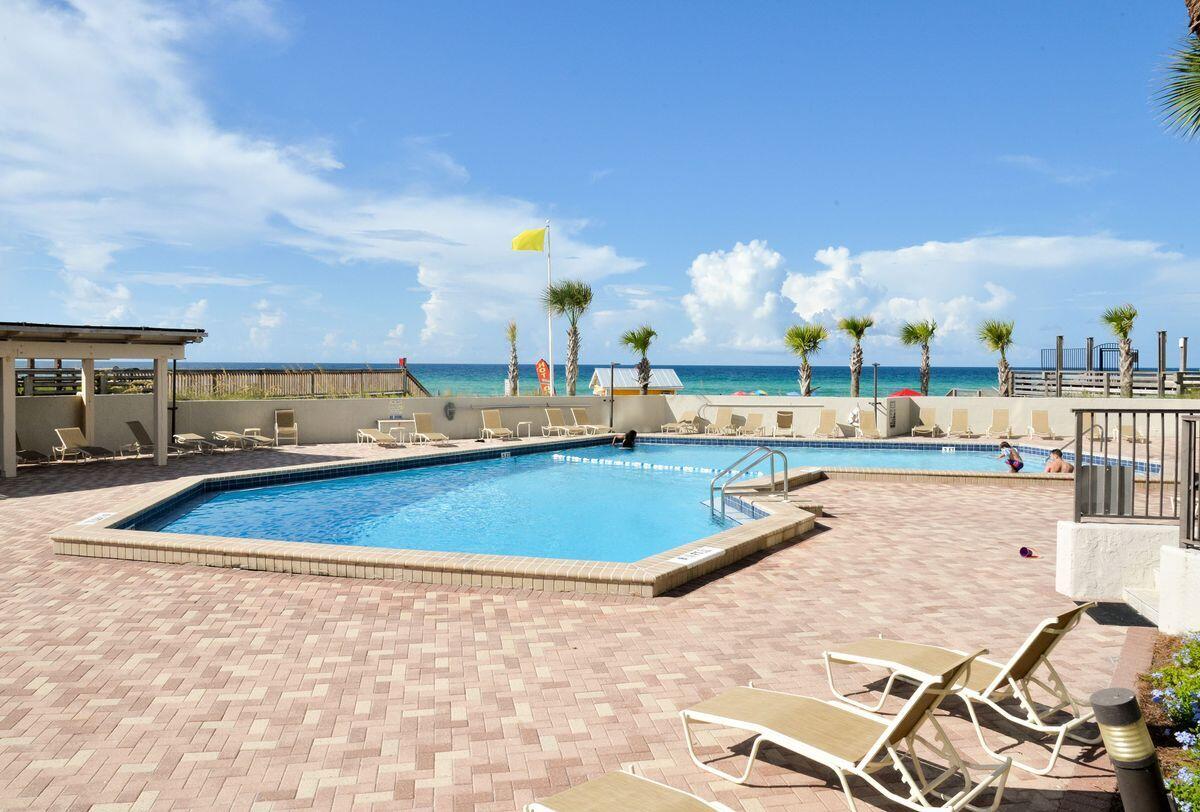 4252 Beachside 2, Unit 252 Miramar Beach, FL 32550 - Photo 23 of 27 a view of a swimming pool and an outdoor seating