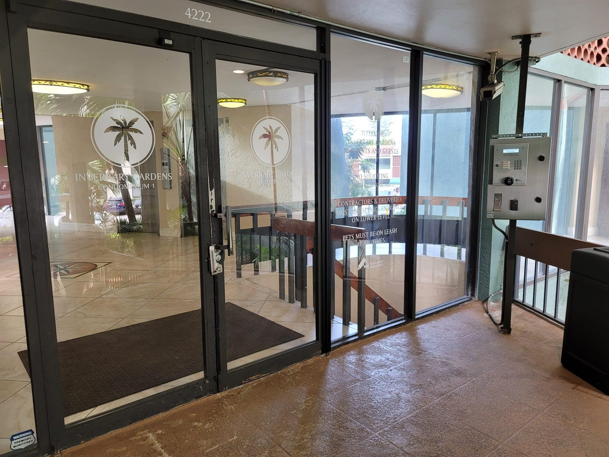 4222 Inverrary Boulevard, Unit 4413 Lauderhill, FL 33319 - Photo 4 of 34 Lobby Doors and Call box