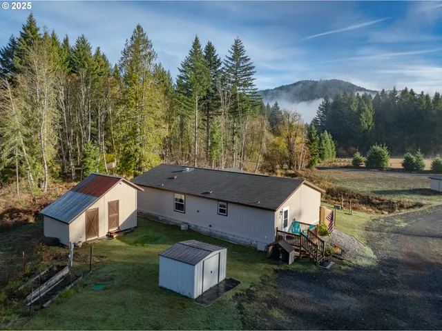 an aerial view of a house with a garden