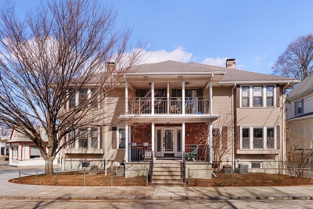 10 Washington Avenue, Unit 2 Waltham, MA 02453 - Photo 21 of 26 a front view of a building with street view