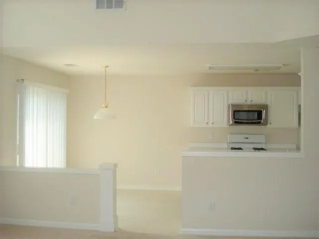 a bathroom with a sink a mirror and a bathtub