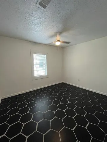 a view of a livingroom with a window
