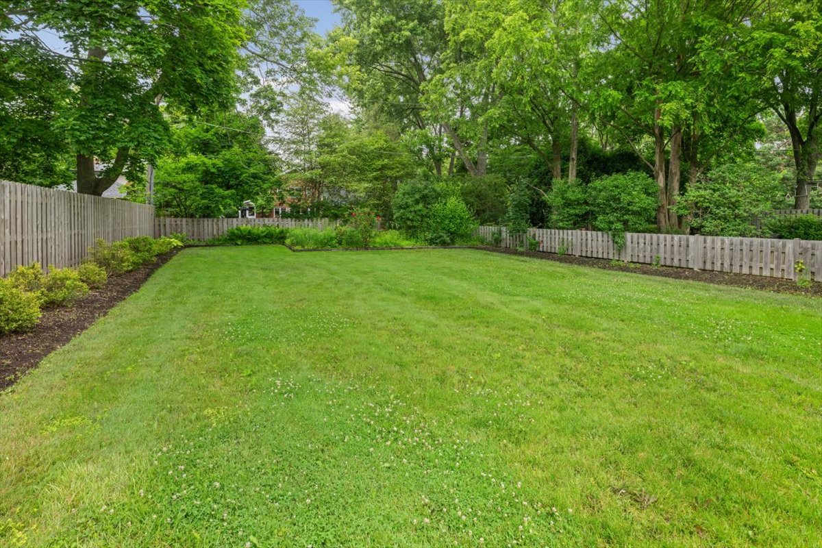 198 Wildwood Road Lake Forest, IL 60045 - Photo 8 of 37 a view of a backyard with a trees