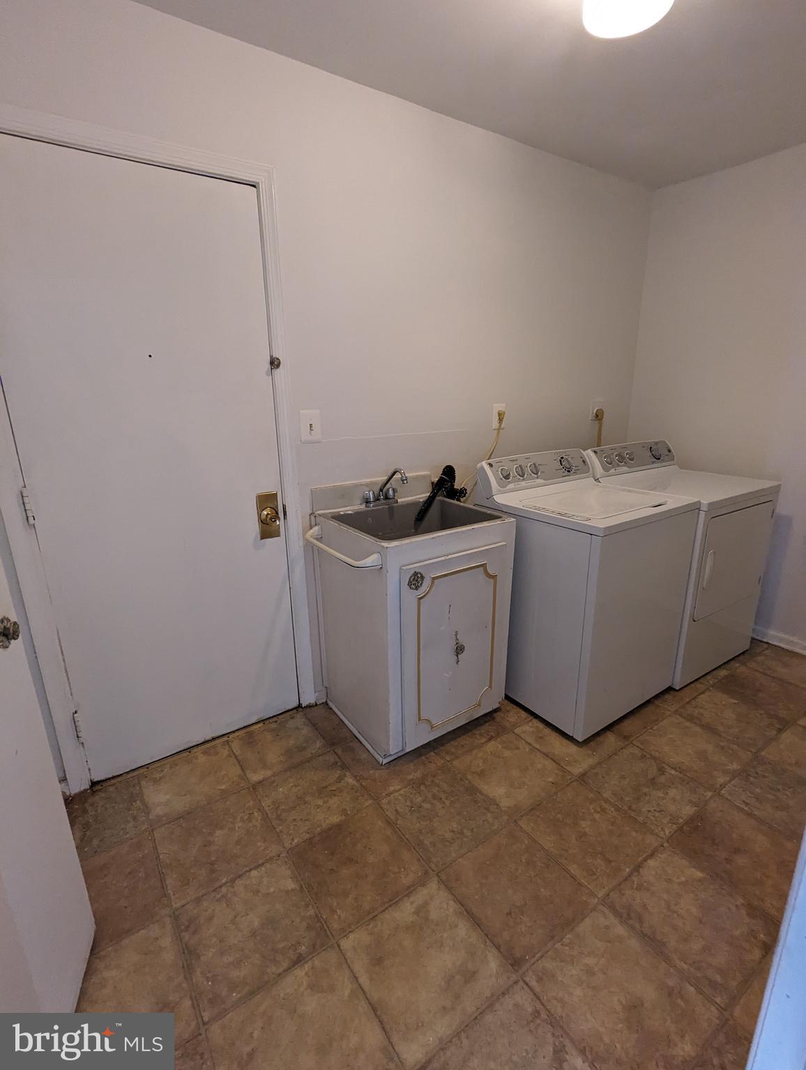14112 Rippling Brook Drive Silver Spring, MD 20906 - Photo 14 of 30 main level laundry room