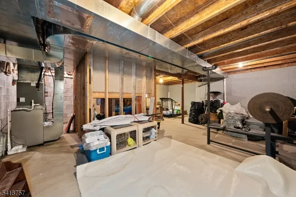 a bed room with a bed and a table